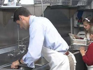 Paul Ryan washing clean pots at empty soup kitchen