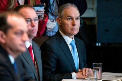 Environmental Protection Agency chief Scott Pruitt listens to President Trump address reporters before a meeting at the White House this month. (EPA-EFE/Shutterstock)